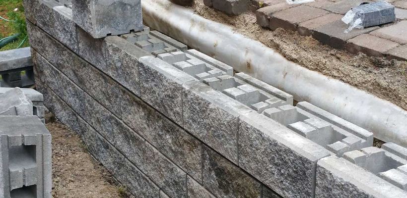 Large precast block retaining wall
